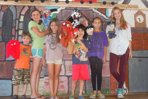 Kathy King with participants at the NFLT's pilot Puppetry Program, who will be performing their original puppet show at the NFLT church in Tichborne on Saturday July 27 at 1:30PM